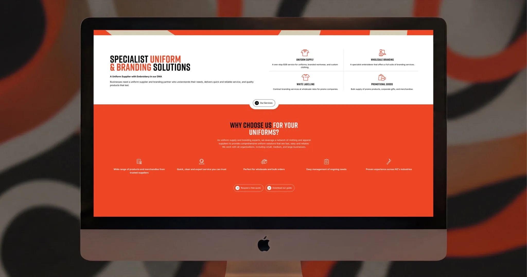 Creative Embroidery homepage services section shown on an iMac