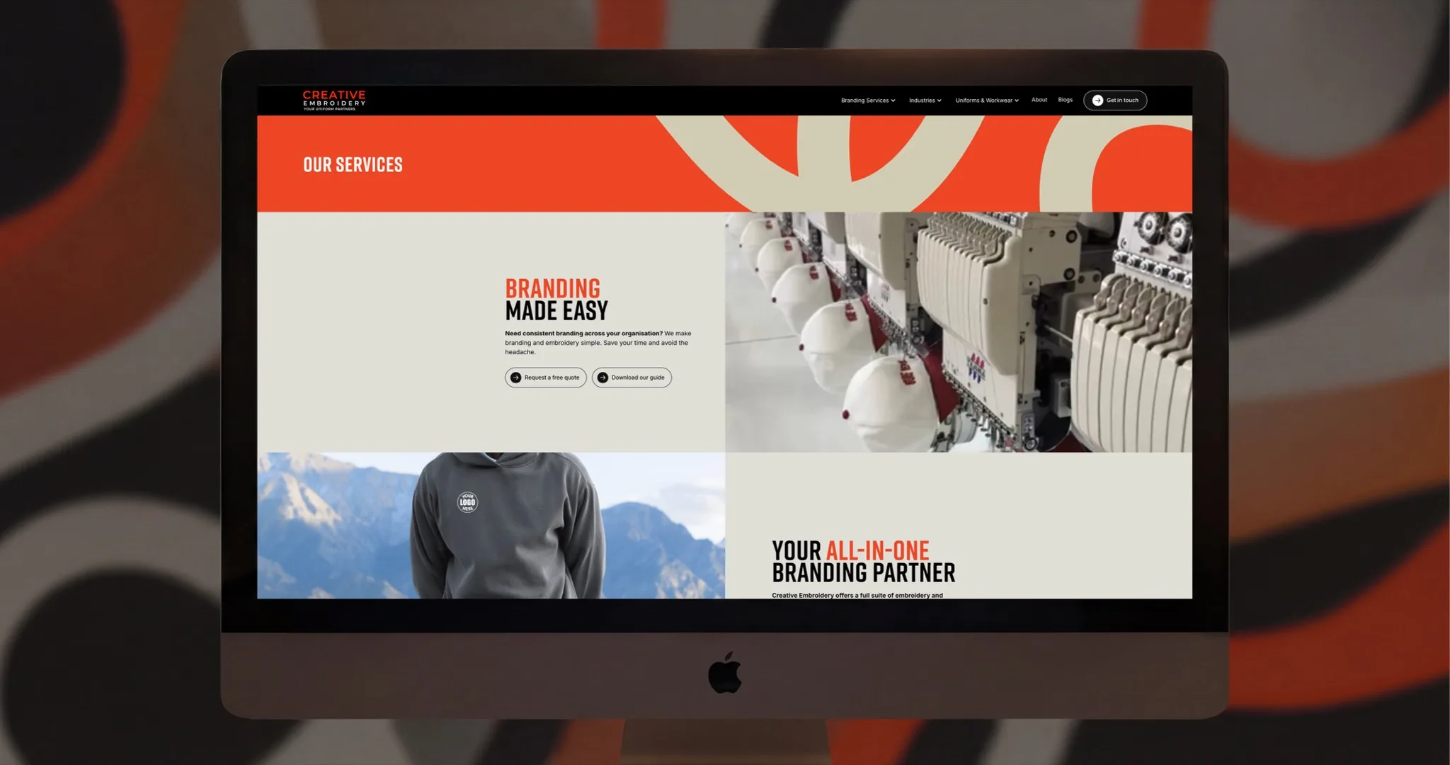 Creative Embroidery services page shown on an iMac